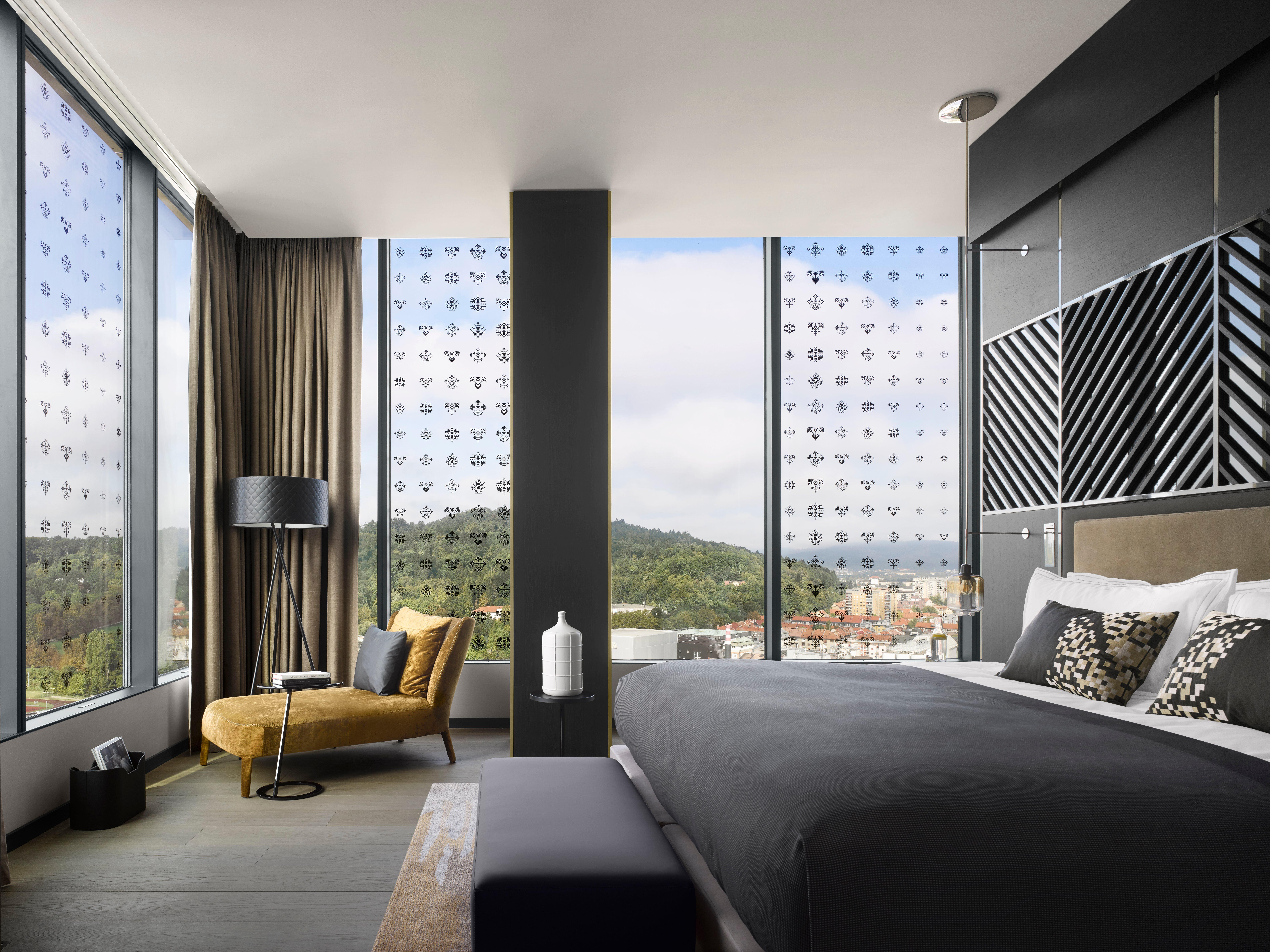 Intercontinental - Ljubljana By Ihg Hotel Kültér fotó A bedroom at the hotel
